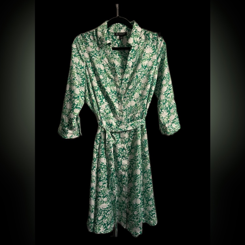 Green and white tea length dress